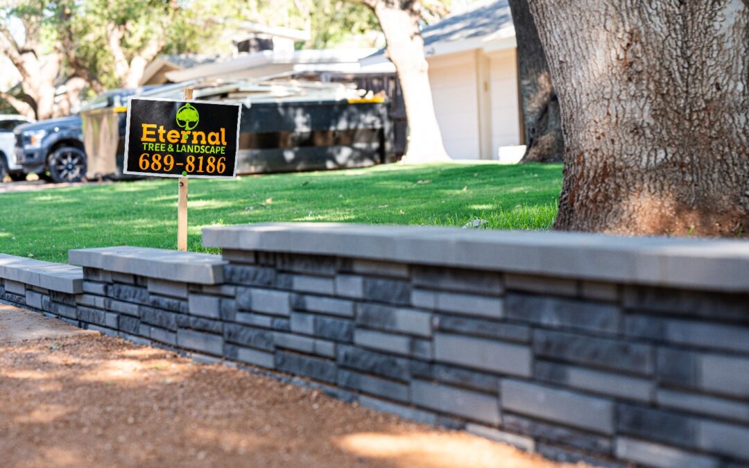 Installation of a landscape retaining wall.